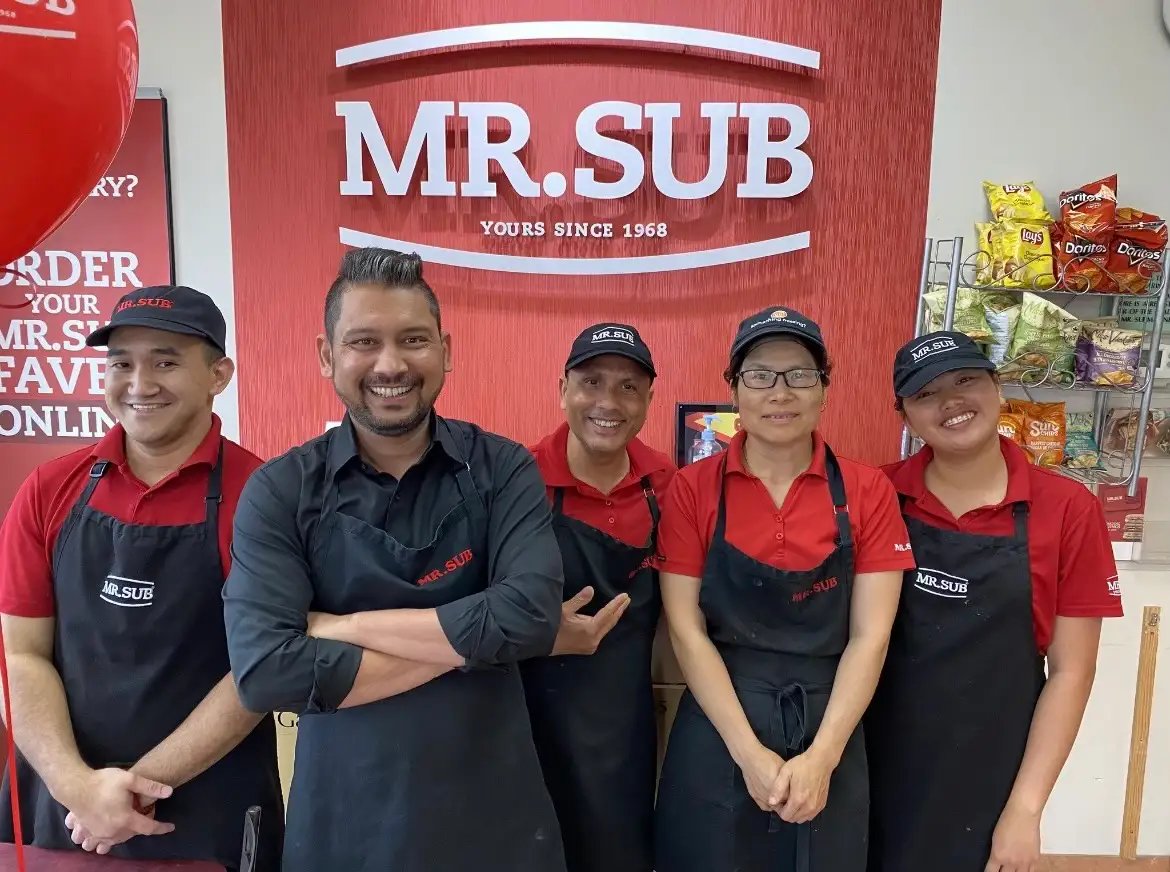 MR.SUB restaurant staff group photo highlighting teamwork and friendly service at this Canadian food franchise location.